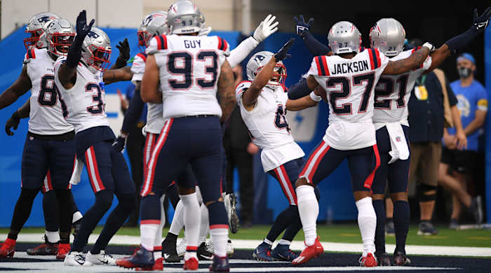 patriost-defense-celebrates-chargers-win